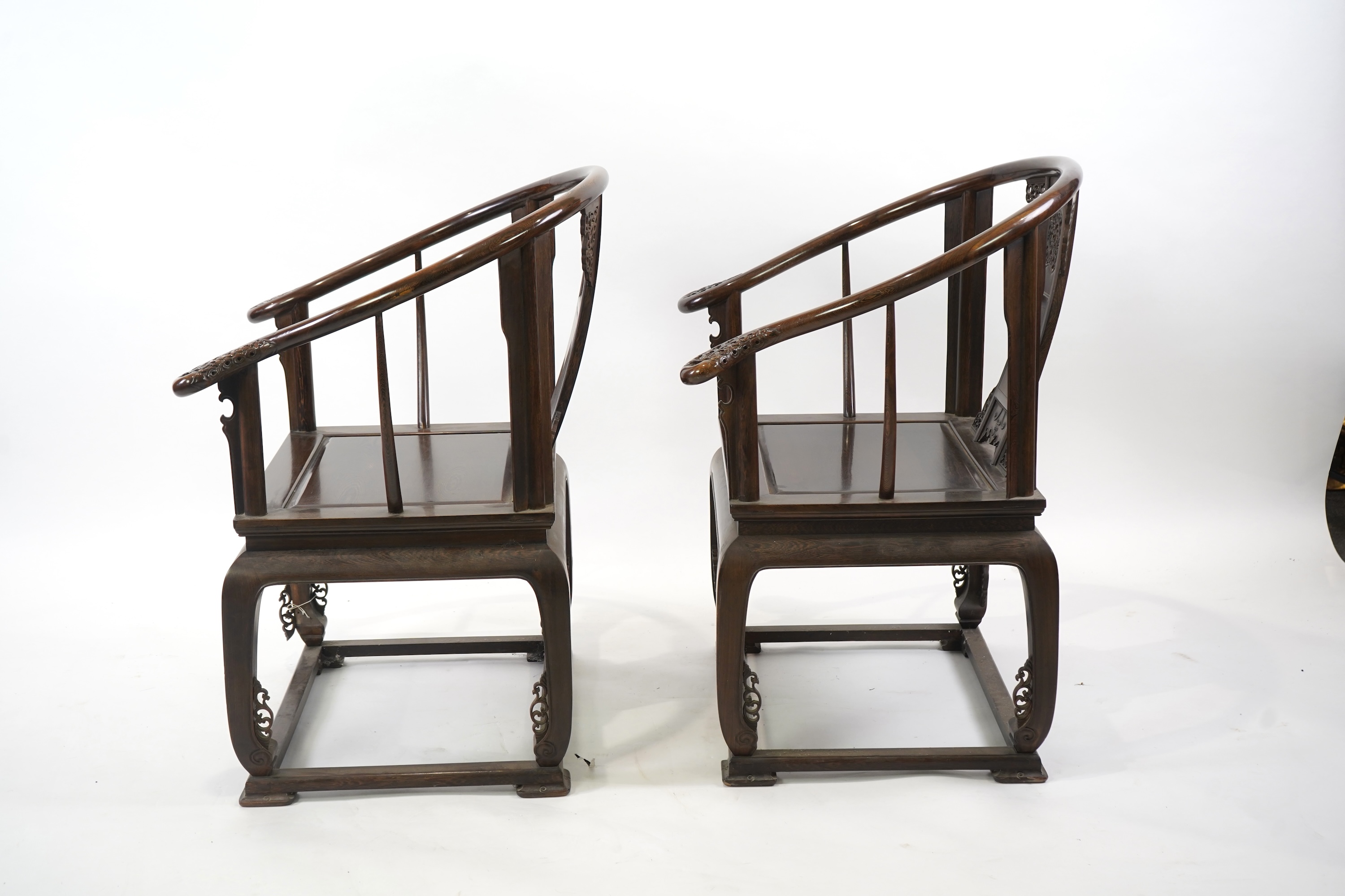A pair of Chinese jichimu horseshoe shaped armchairs and a matching table, 19th/20th century